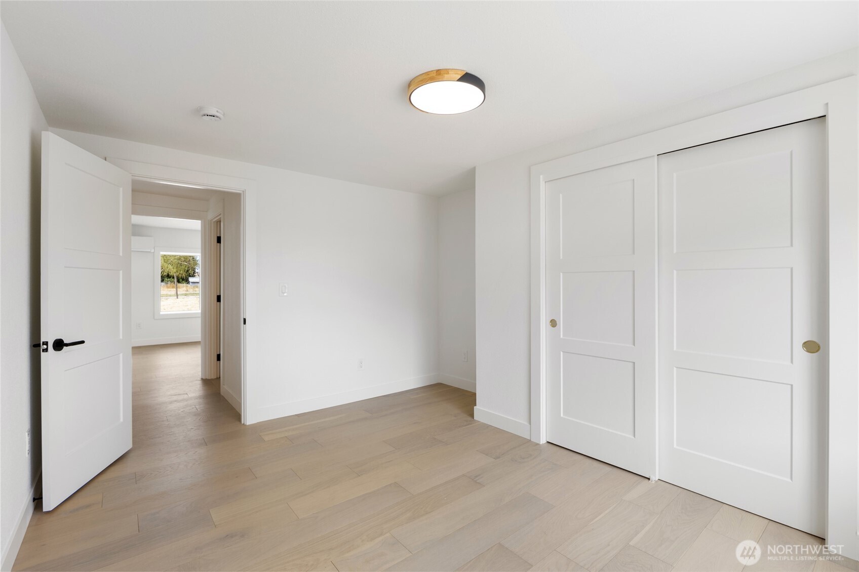 77 Diamond Street Electric City, WA 99123 - Photo 23 of 40 an empty room with closet and mirror