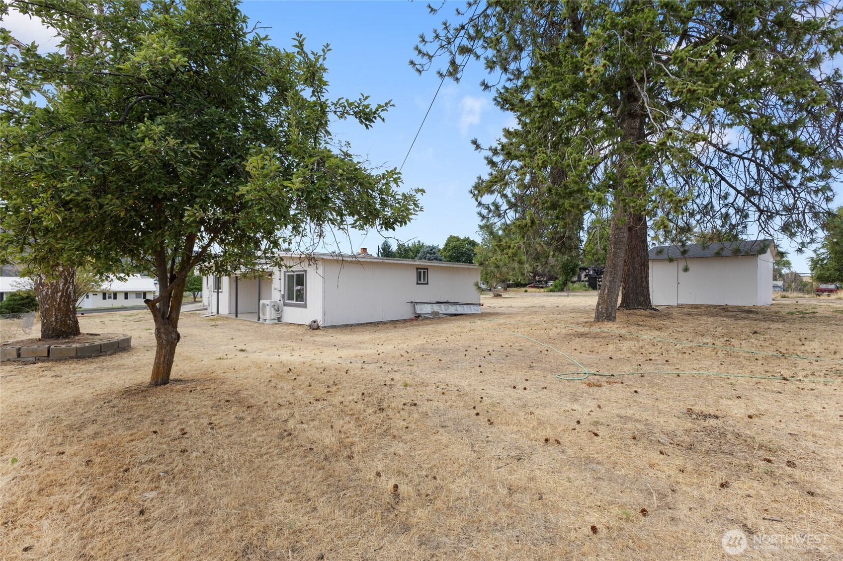 77 Diamond Street Electric City, WA 99123 - Photo 29 of 40 a house view with a trees
