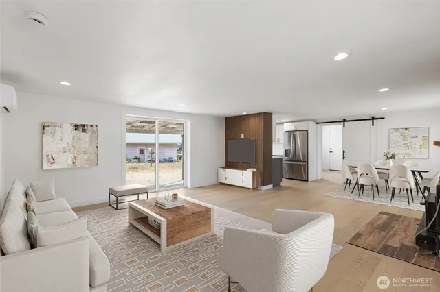 a living room with furniture and a table