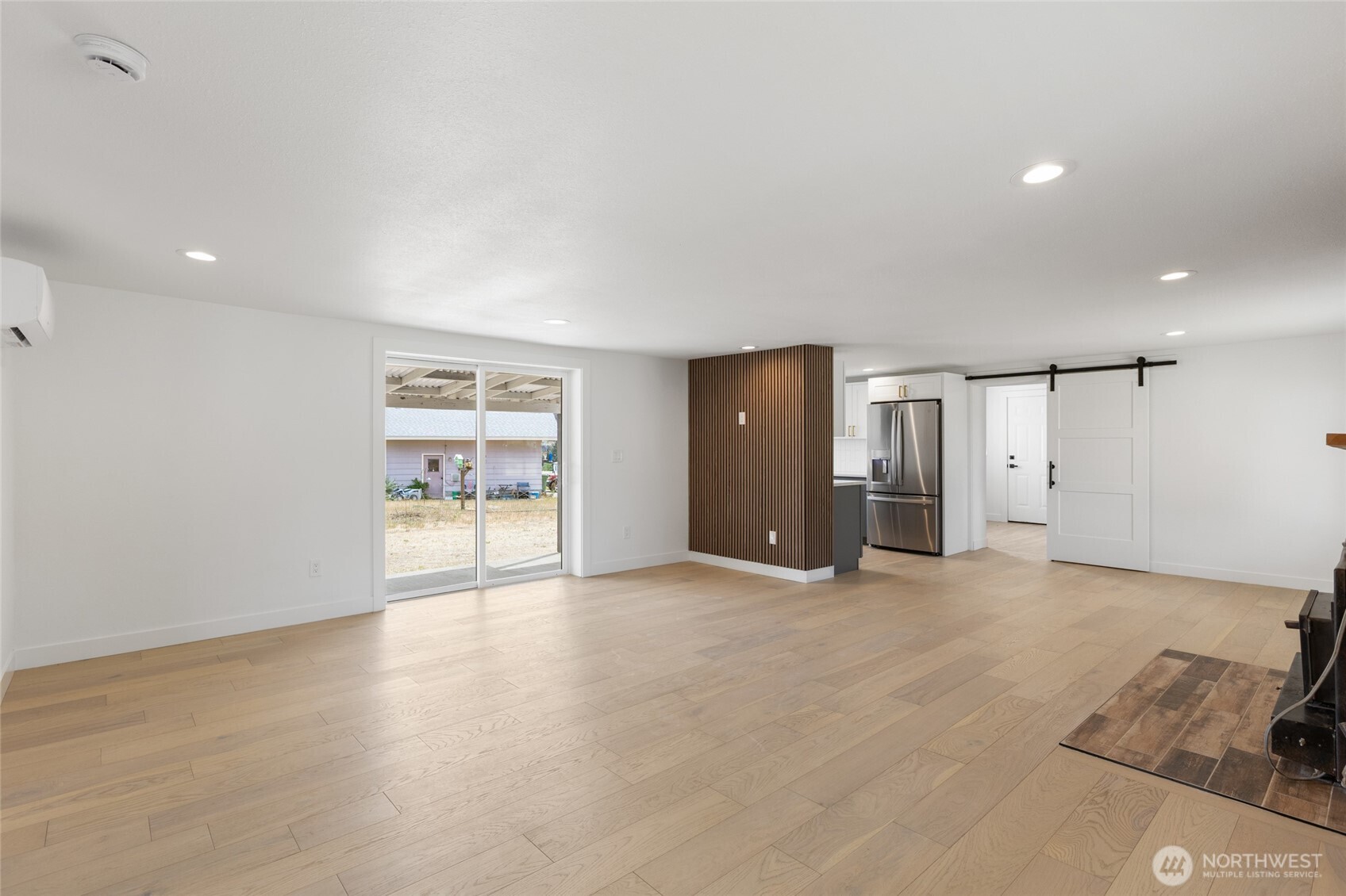 77 Diamond Street Electric City, WA 99123 - Photo 7 of 40 a view of an empty room with a window