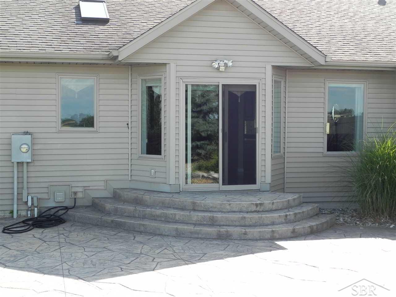7321 Fraser Road Freeland, MI 48623 - Photo 44 of 60 BACK VIEW WITH STAMPED CONCRETE PATIO