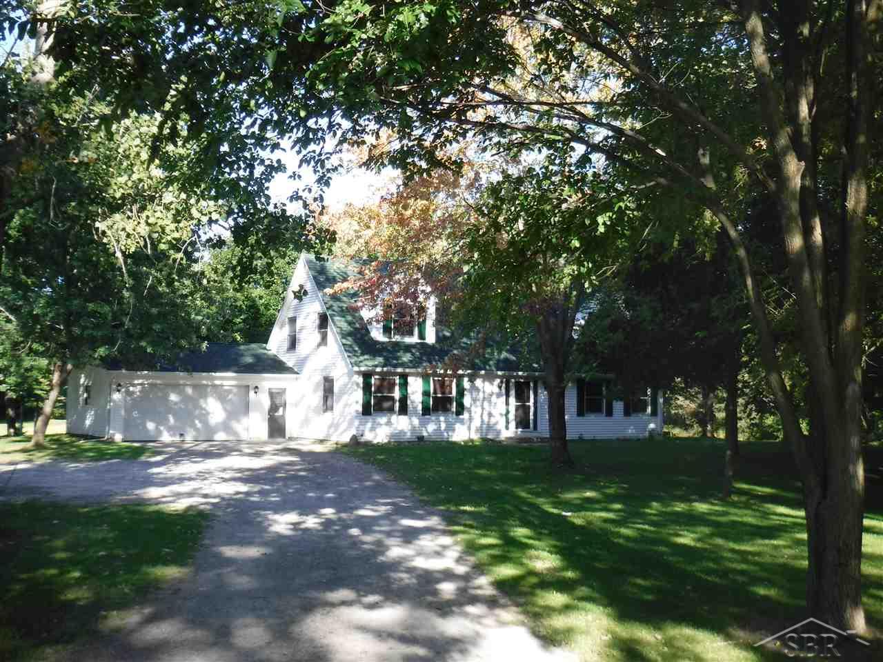 13071 Neff Road Clio, MI 48420 - Photo 1 of 25 Tuck away off the road and amidst the trees is this 6 bedroom home.