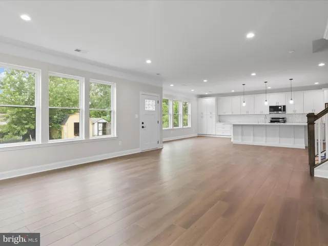 a bathroom with a toilet a sink and bathtub