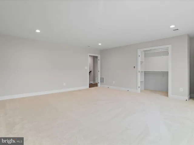 a bathroom with a shower and a bathtub