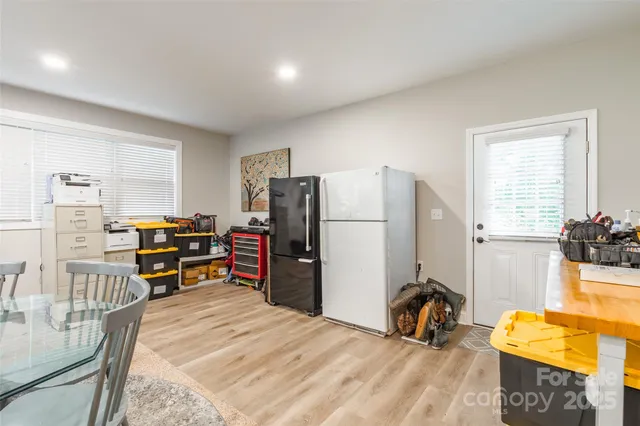 a room with a bed and a table in it