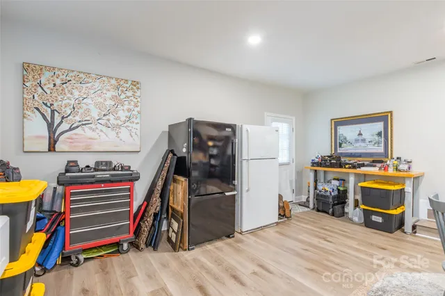 a room with furniture and a flat screen tv