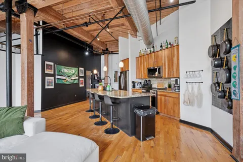 a view of a kitchen and dining room