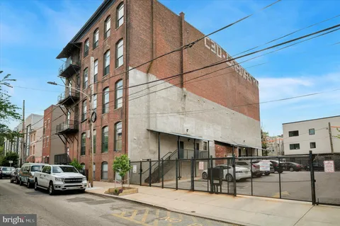 a car parked in front of a building