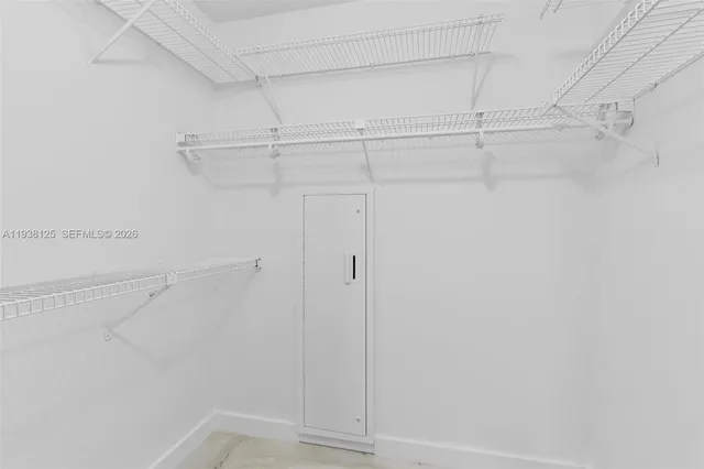 a view of a room with racks on the wall