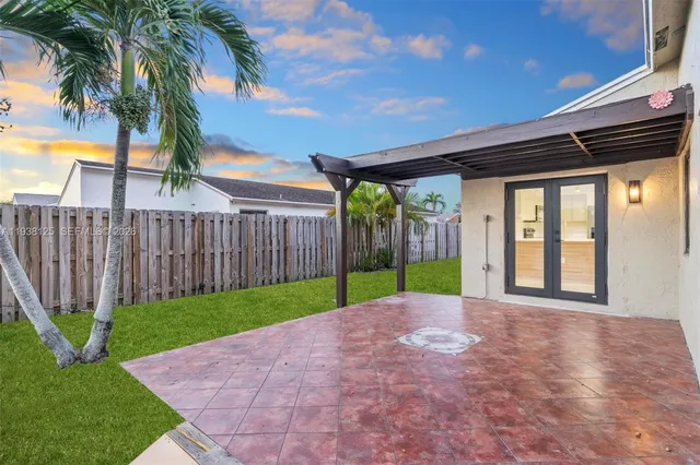 a view of a porch with a backyard