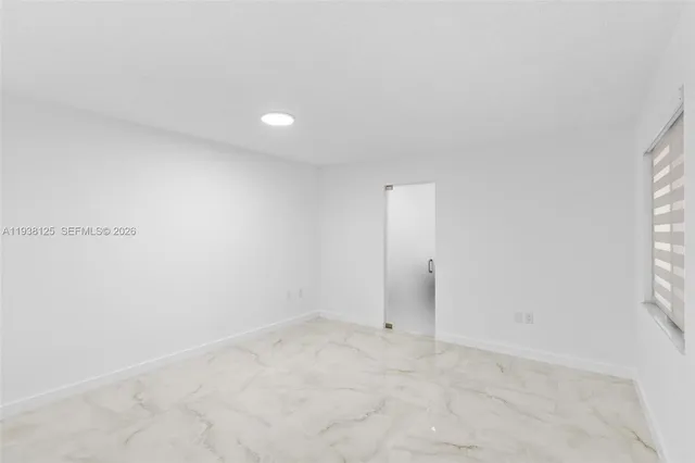 an empty room with a natural light
