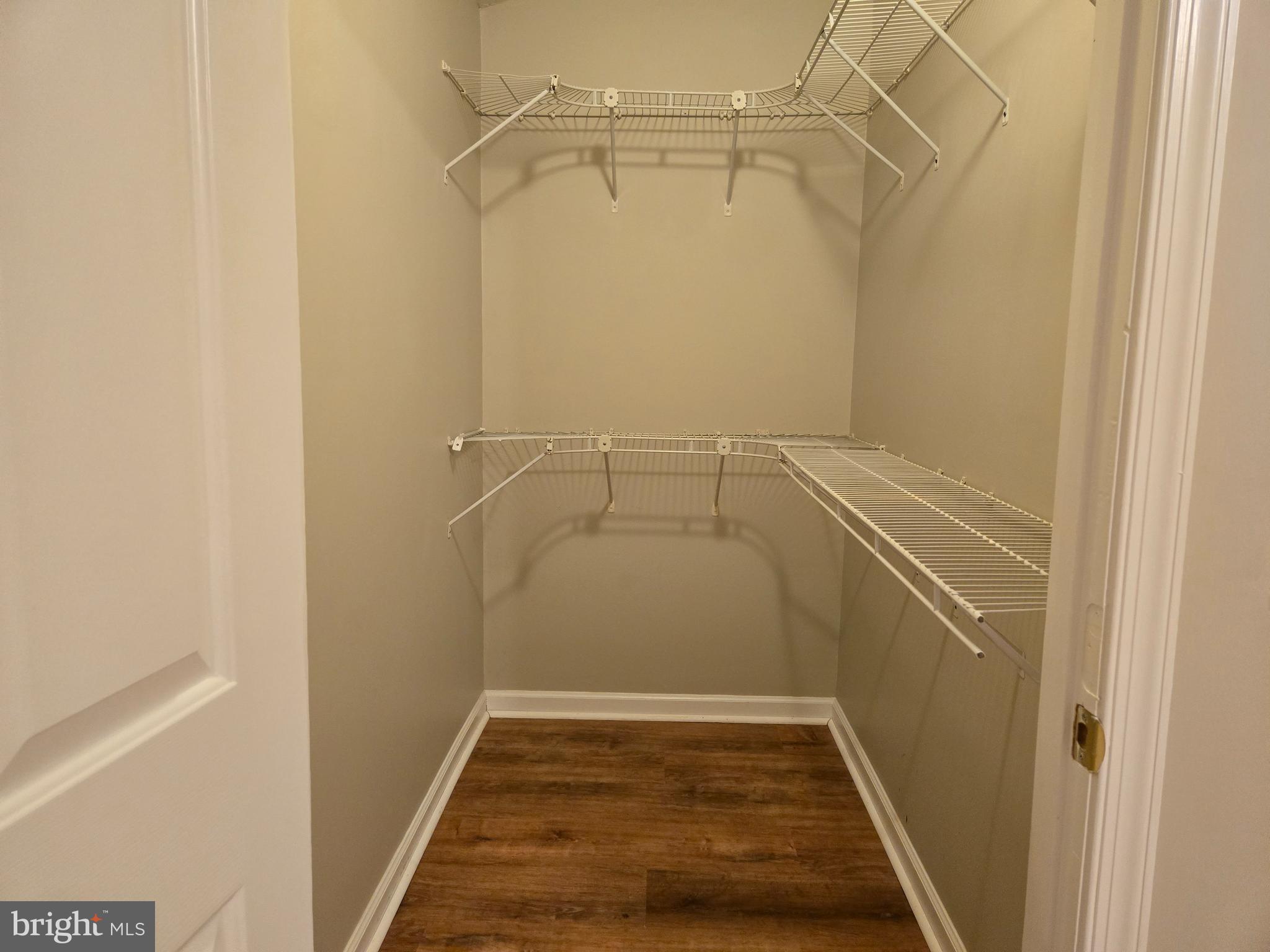 161 Ingle Place Alexandria, VA 22304 - Photo 13 of 21 a view of storage and utility room with racks on the wall