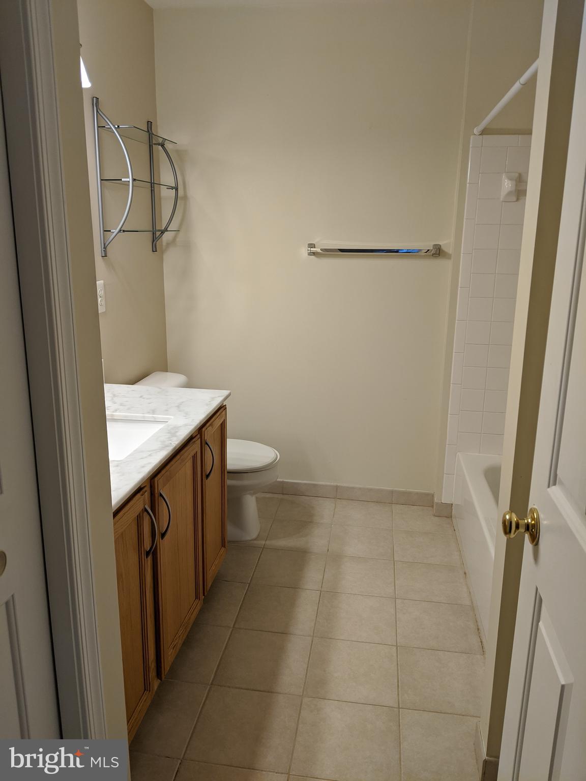 161 Ingle Place Alexandria, VA 22304 - Photo 15 of 21 a bathroom with a sink a toilet and shower