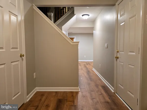 a view of hallway with stairs