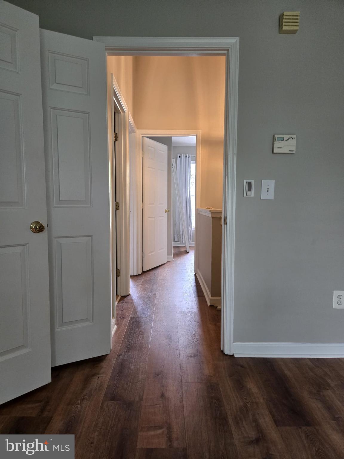 161 Ingle Place Alexandria, VA 22304 - Photo 7 of 21 a view of a hallway with wooden floor