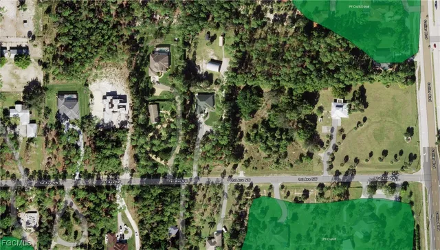 a view of a garden with a building