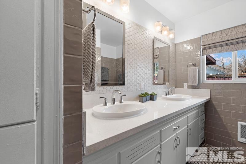 1051 Keystone Avenue Reno, NV 89503 - Photo 16 of 25 a bathroom with a double vanity sink mirror and double