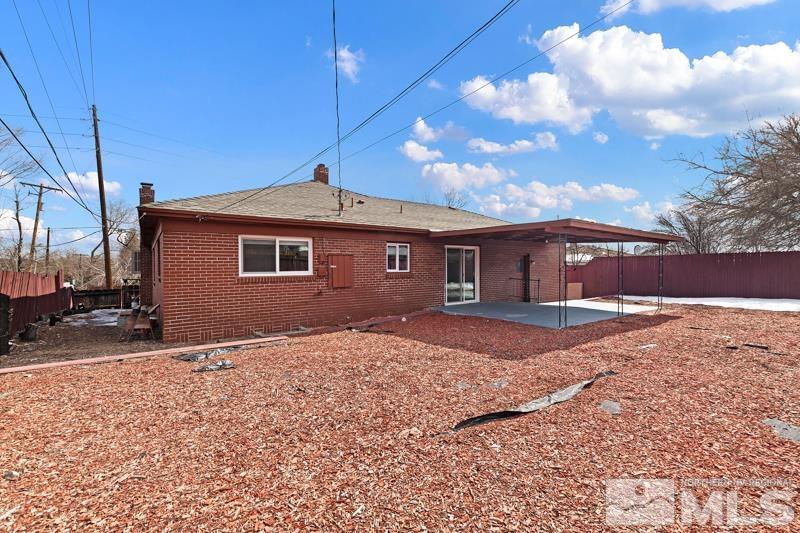 1051 Keystone Avenue Reno, NV 89503 - Photo 23 of 25 a front view of a house with a yard