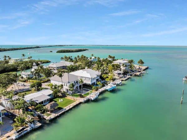 a view of a balcony with chairs
