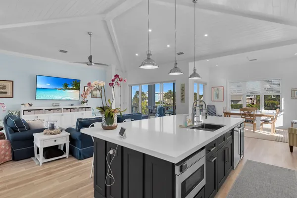 a bedroom with a large bed and a couch