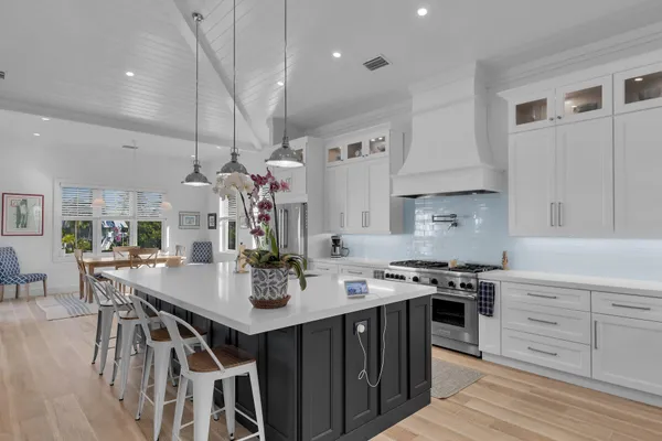 a bedroom with bed and painting on the wall