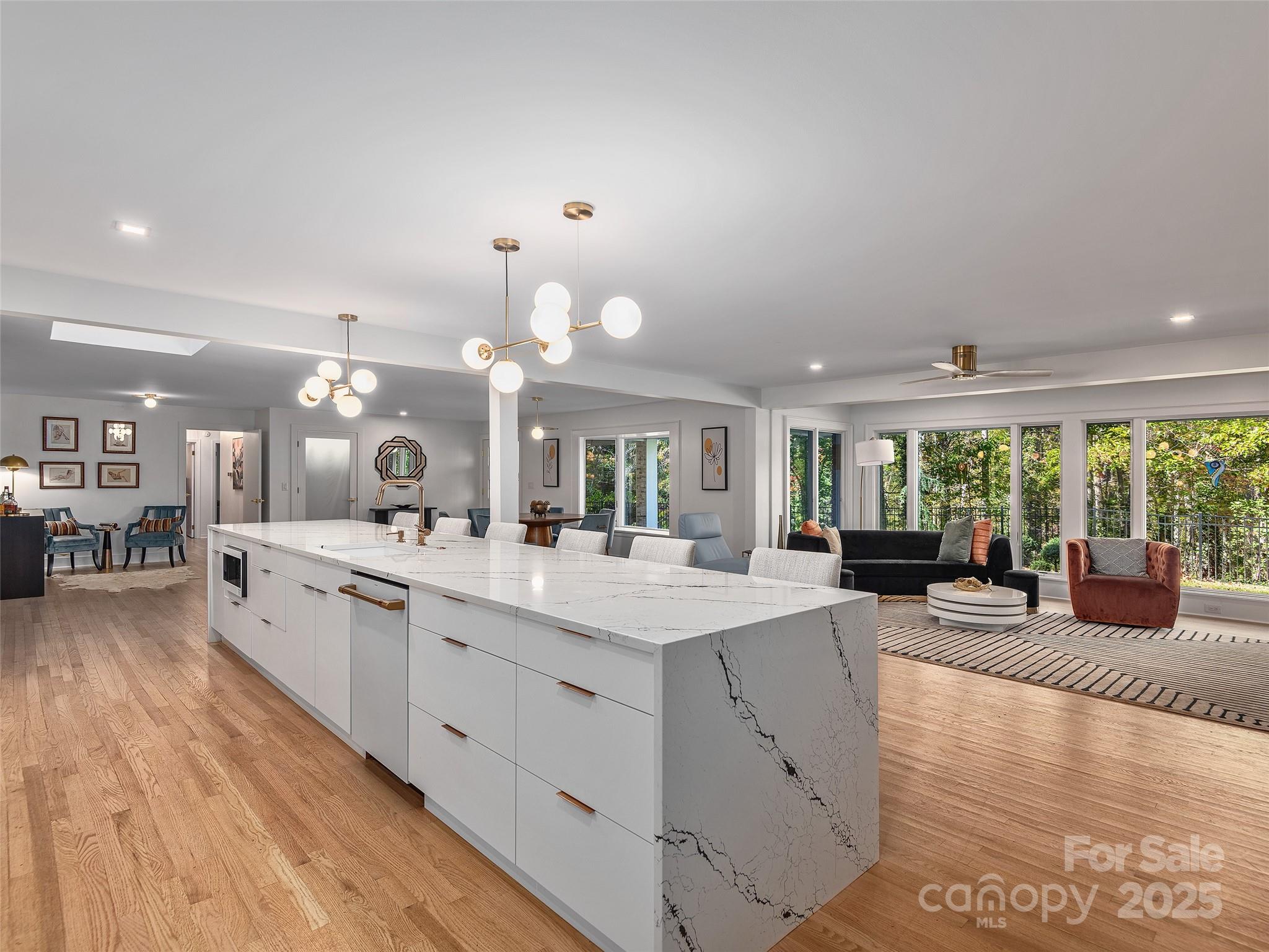 51 Rice Branch Road Asheville, NC 28804 - Photo 11 of 48 a large white kitchen with a large window