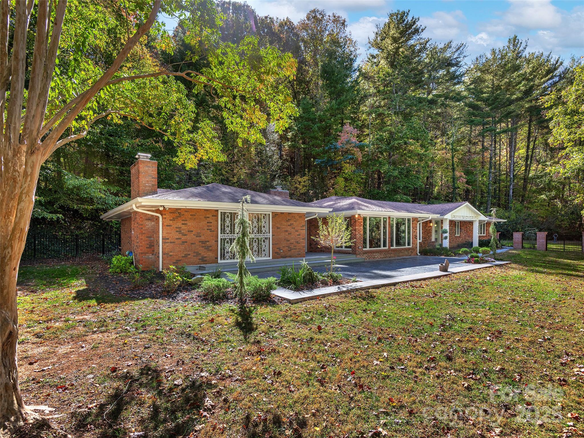51 Rice Branch Road Asheville, NC 28804 - Photo 2 of 48 a house view with a outdoor space