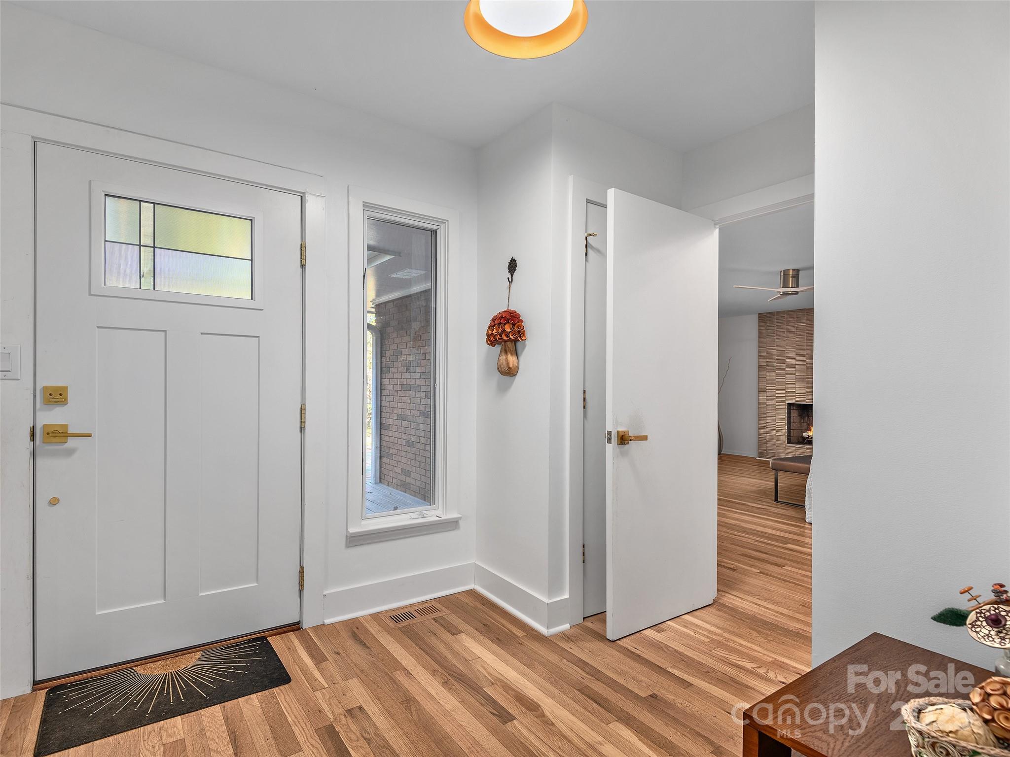 51 Rice Branch Road Asheville, NC 28804 - Photo 24 of 48 a view of livingroom with furniture and wooden floor