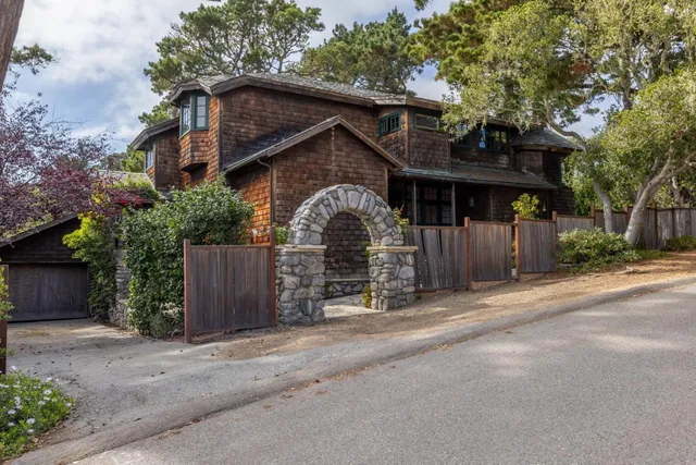 a front view of a house with a garage