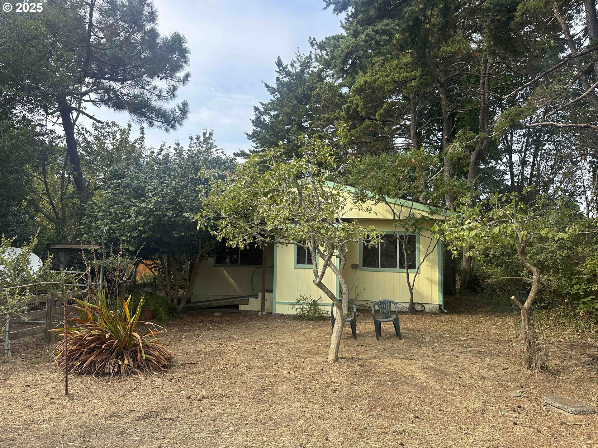 628 13th Street Port Orford, OR 97465 - Photo 11 of 12 a house view with a seating space