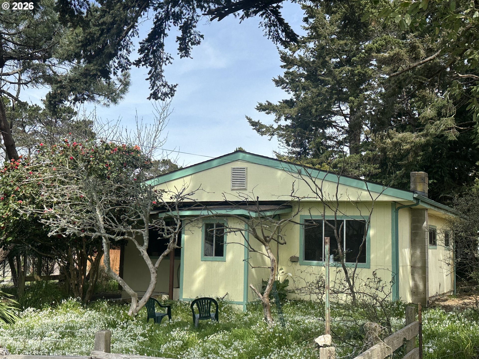 628 13th Street Port Orford, OR 97465 - Photo 12 of 12 a front view of a house with a yard