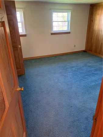 a view of a room with racks on the wall