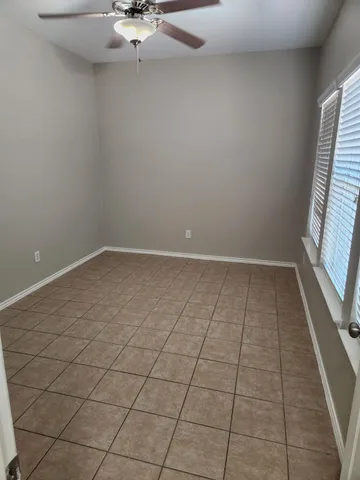 en empty room with windows