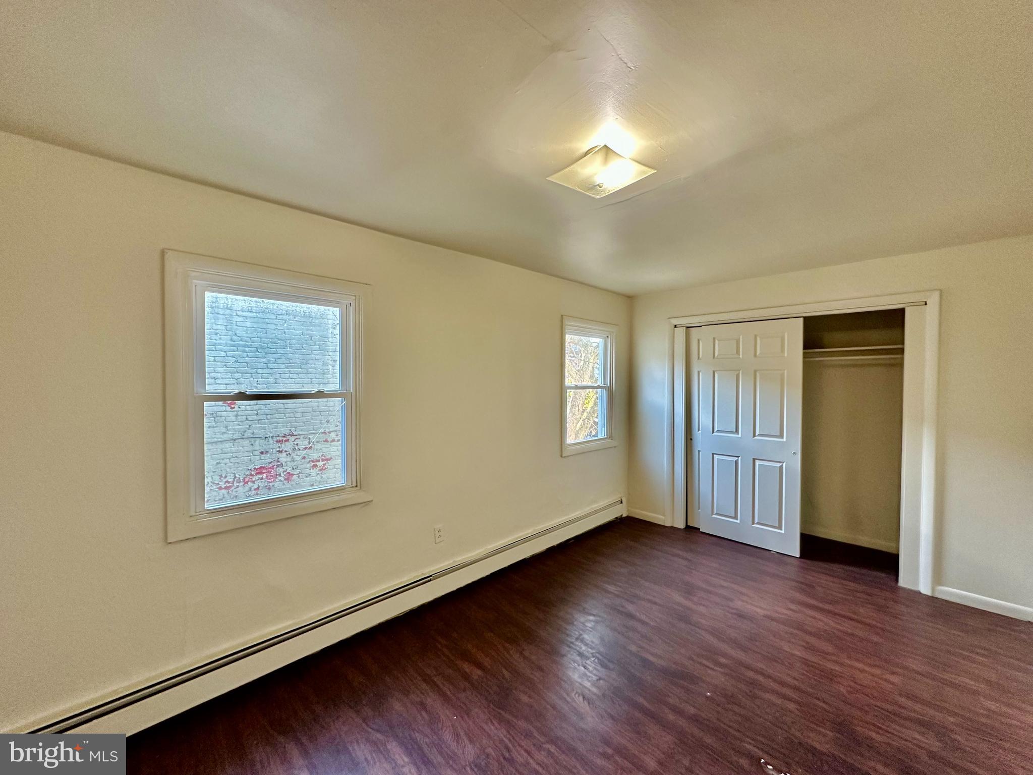 520 South Duke Street Lancaster, PA 17602 - Photo 9 of 13 a view of an empty room with wooden floor and a window