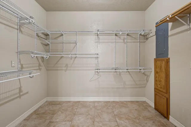 a bathroom with a shower and toilet