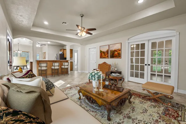 a living room with furniture and a table