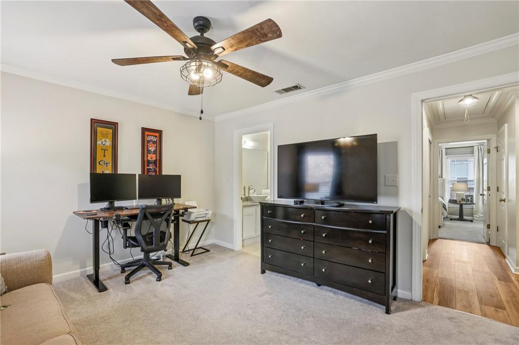 7500 Roswell Road, Unit 24 Sandy Springs, GA 30350 - Photo 20 of 45 a view of a livingroom with workspace and a window