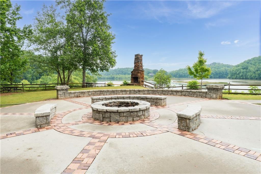 7500 Roswell Road, Unit 24 Sandy Springs, GA 30350 - Photo 42 of 45 a view of a swimming pool and a yard