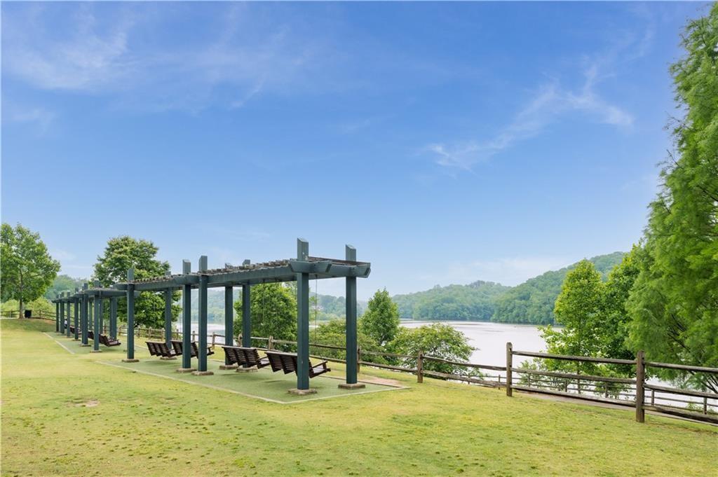 7500 Roswell Road, Unit 24 Sandy Springs, GA 30350 - Photo 45 of 45 a view of a swimming pool with a garden