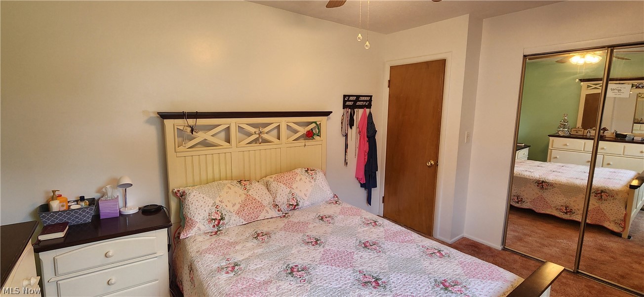 5852 Lake Road Mentor, OH 44060 - Photo 14 of 45 Carpeted bedroom with a closet and ceiling fan