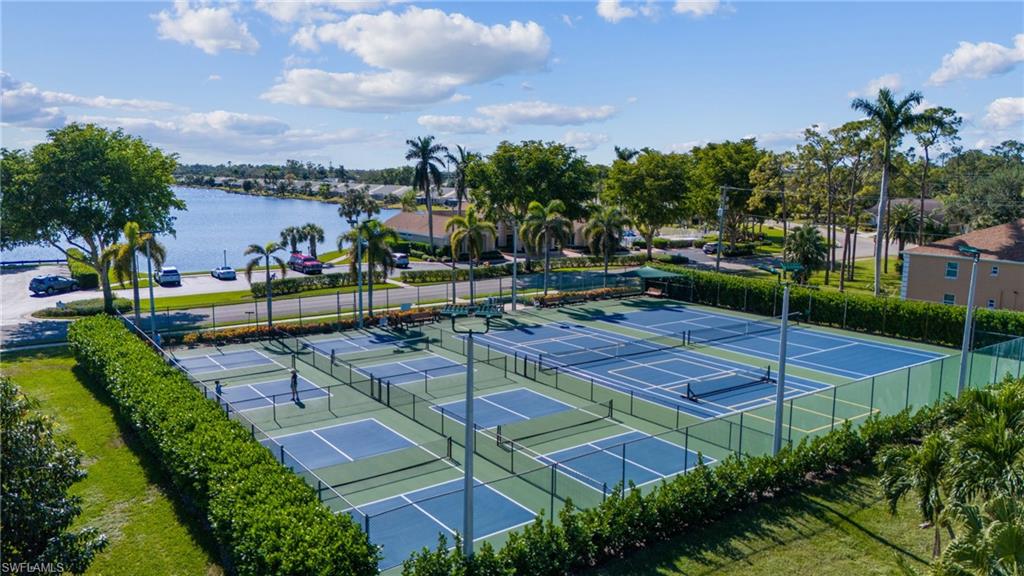 1747 Reuven Circle, Unit 1703 Naples, FL 34112 - Photo 21 of 31 a view of a backyard with swimming pool