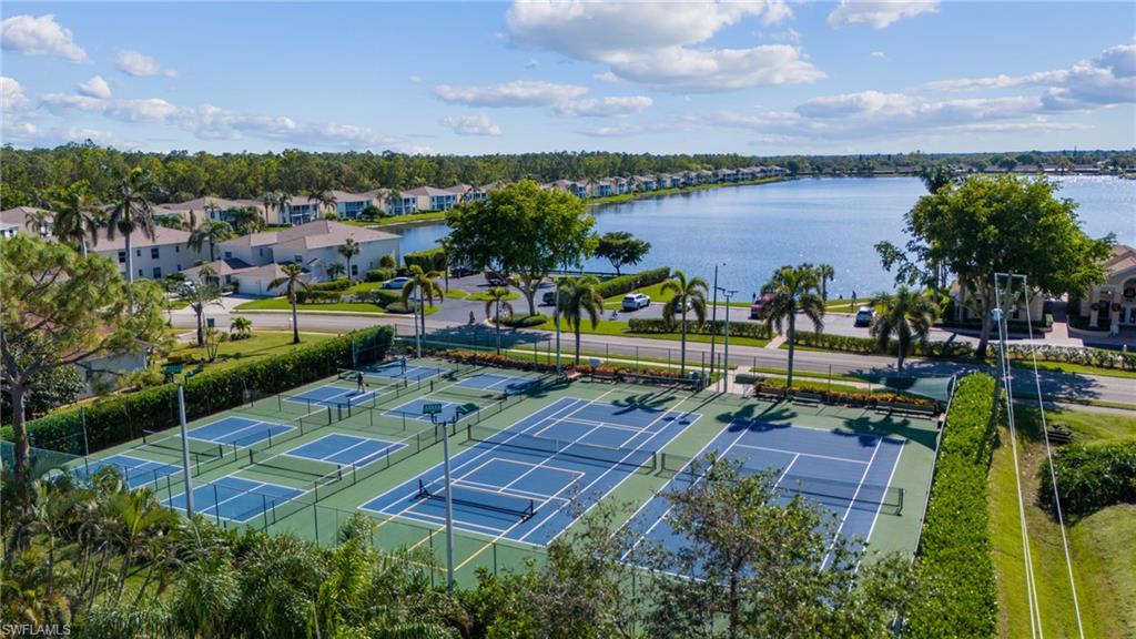 1747 Reuven Circle, Unit 1703 Naples, FL 34112 - Photo 29 of 31 a view of a lake with a city