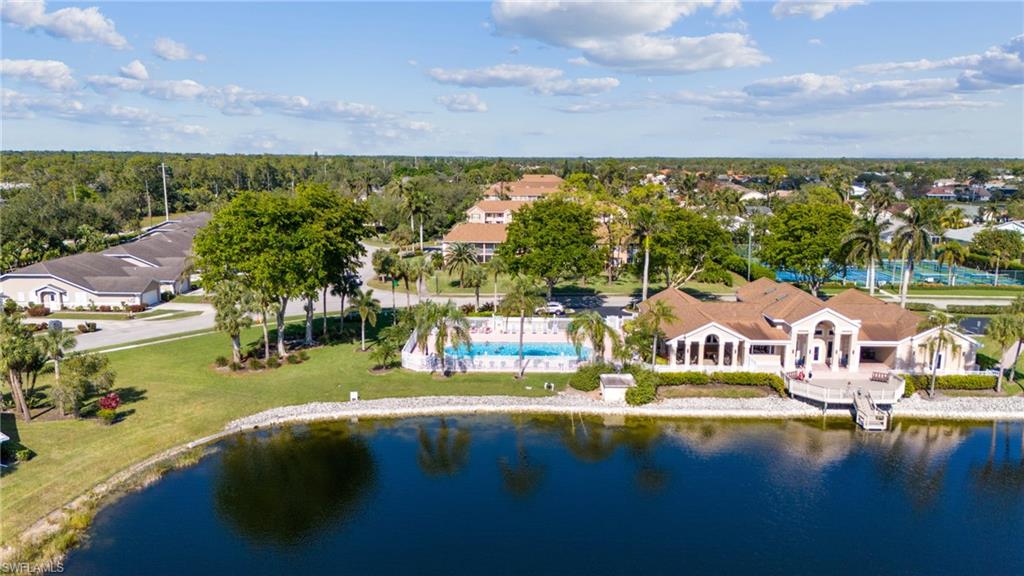 1747 Reuven Circle, Unit 1703 Naples, FL 34112 - Photo 30 of 31 a view of swimming pool with outdoor seating