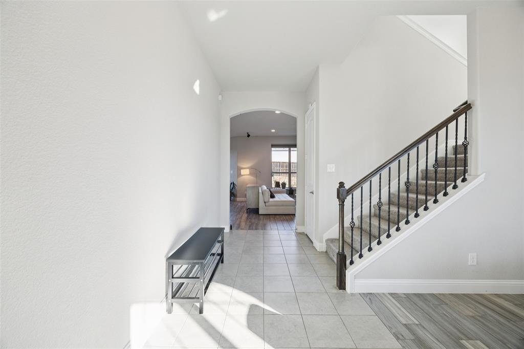 1701 Long Meadow Road Wylie, TX 75098 - Photo 2 of 30 a view of a hallway with kids room