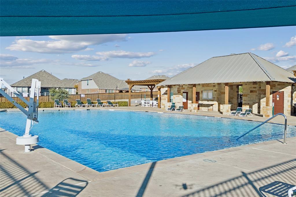 1701 Long Meadow Road Wylie, TX 75098 - Photo 28 of 30 a view of a house with a yard