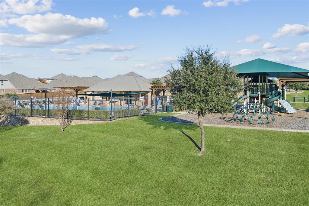 1701 Long Meadow Road Wylie, TX 75098 - Photo 29 of 30 a view of a garden with a slide