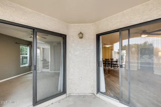 a street sign that is sitting in front of a house