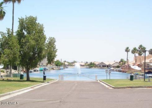 9151 West Greenway Road, Unit 111 Peoria, AZ 85381 - Photo 43 of 45 a view of a park with large trees