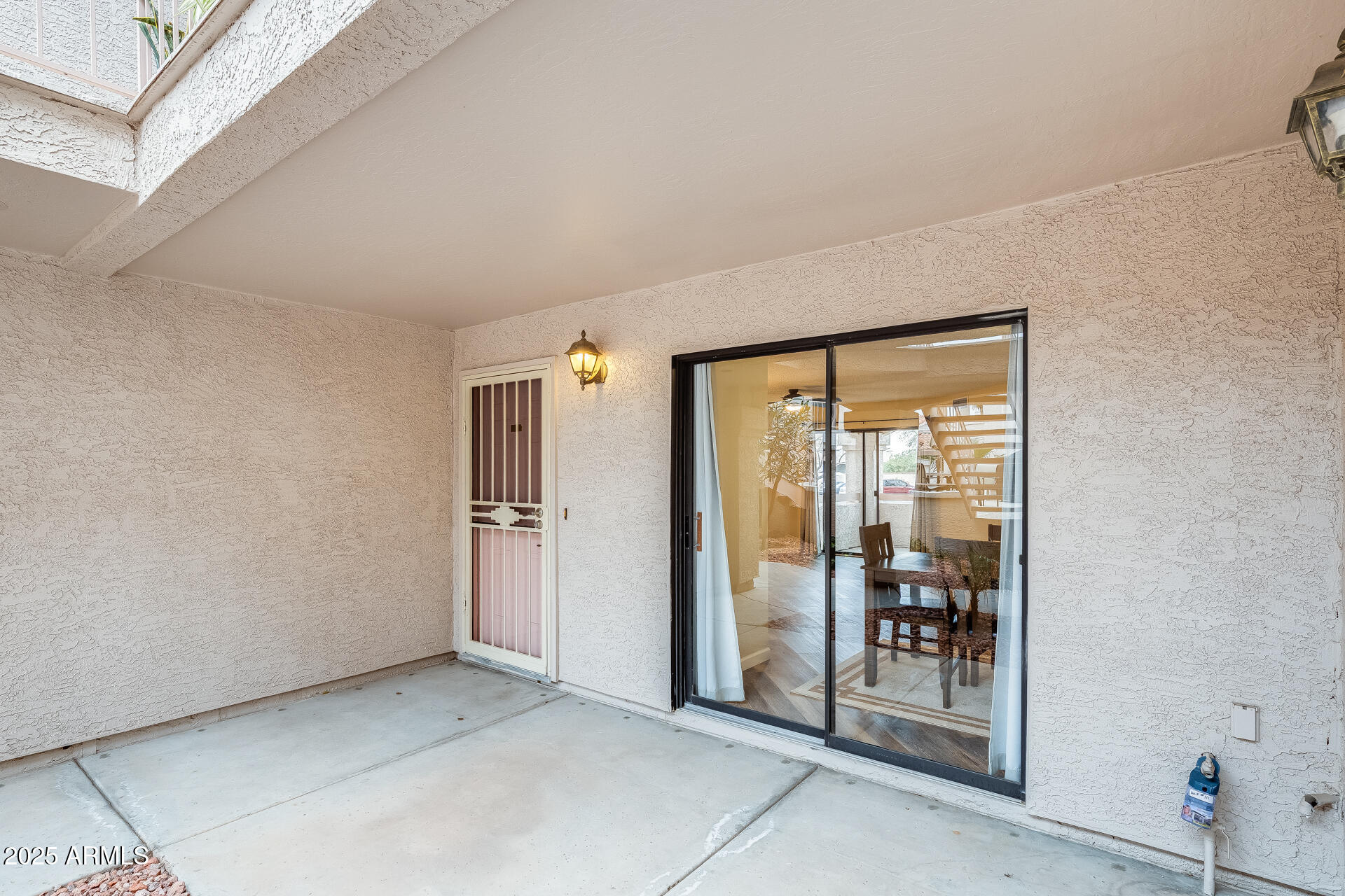 9151 West Greenway Road, Unit 111 Peoria, AZ 85381 - Photo 8 of 45 a view of a room with large windows