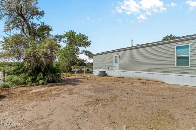 a view of a house with a trees